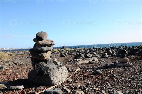 Stacked rocks on the beach 18858077 Stock Photo at Vecteezy