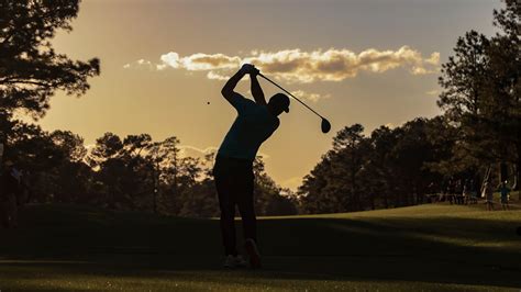 Silhouette Of Brooks Koepka As He Plays A Stroke From The No 15 Tee