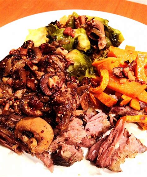 Slow cooked lamb neck with Brussels sprouts and sweet potato chips ...