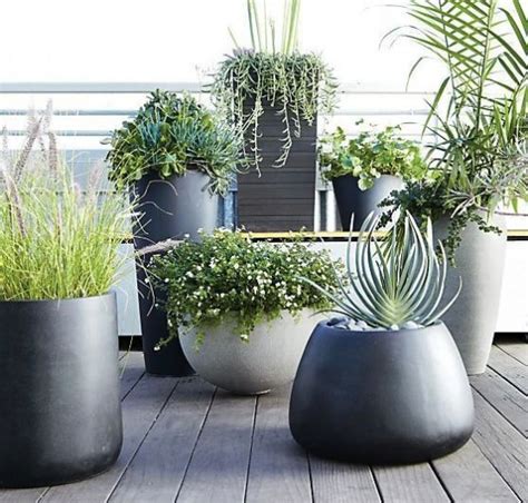 52 Modern Planters To Make Your Outdoors Stylish DigsDigs