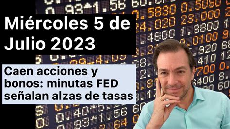 Caen acciones y bonos minutas FED señalan alzas de tasas Subida de