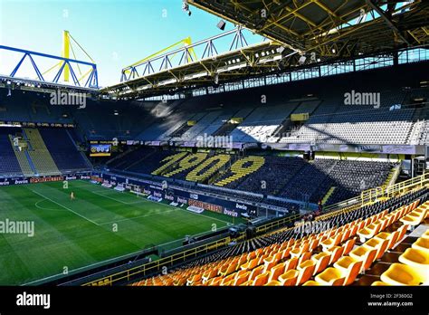 The empty stadium of Borussia Dortmund, Signal Iduna Park. Formerly ...