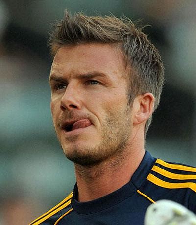 beckham takes  pay cut  la galaxy   times
