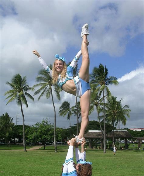 The Flyer Is Performing A The Stunt 1 Word Cheer Dance Cheer Stunts