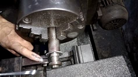 Use Of Small Milling Cutter Over Lathe Machine Cutting Slot On Head Of Screw Over Lathe