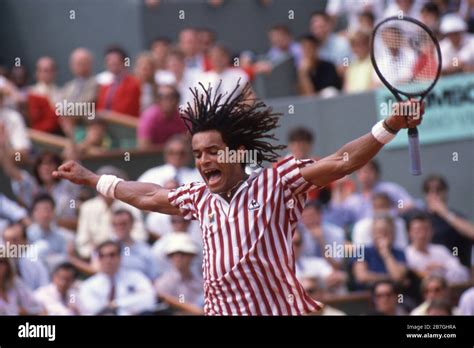 Yannick noah roland garros action hi-res stock photography and images ...