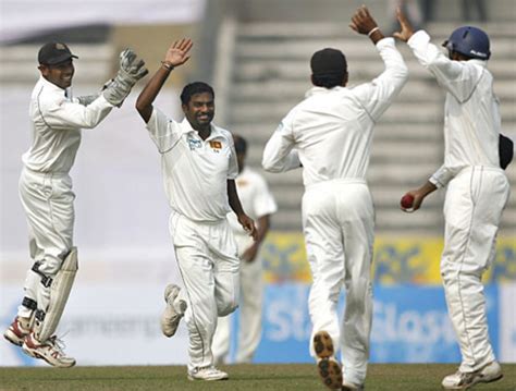 Muttiah Muralitharan Celebrates A Wicket During His Five For