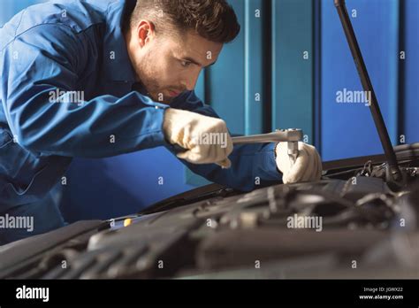 Fixing things. Experiment precise trained repairman employing ...