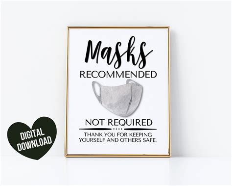 a sign that reads masks recommended not required thank you for keeping ...