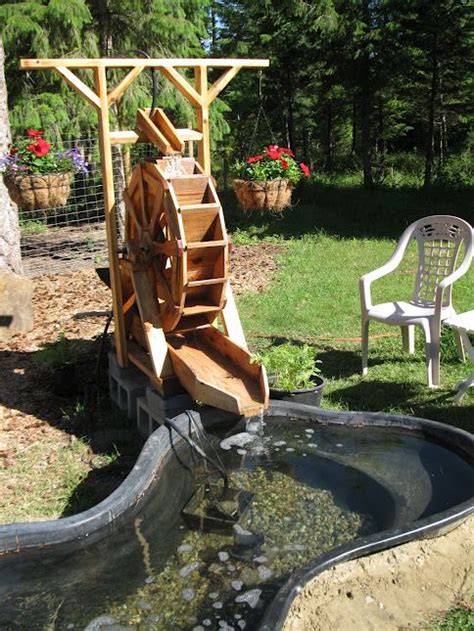 Garden Water Wheel Design - Garden Design Ideas