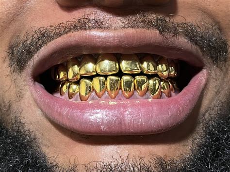 Gangsta Grillz Pure Beauty Black Beauty Gold Grillz Teeth Jewelry