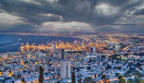 Haifa at night ,cloudy stock image. Image of vessel - 211729243