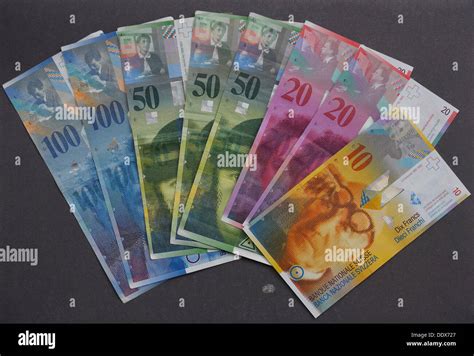 ILLUSTRATION - Banknotes of the Swiss franc currency sit on a table ...