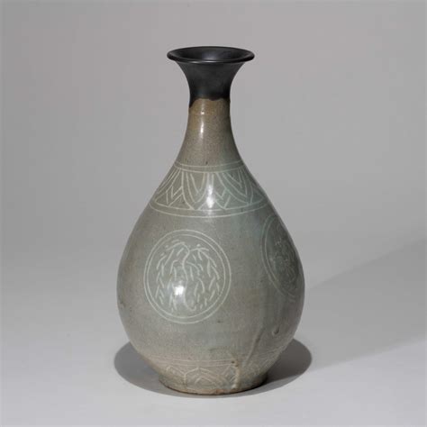 At Auction A Korean Celadon Pear Shaped Vase With Inlaid Willow And