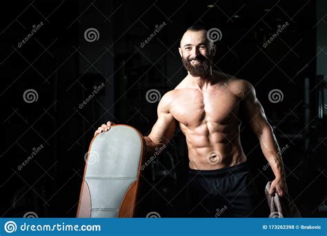 Portrait Of Caucasian Instructor In Fitness Center Gym Stock Photo