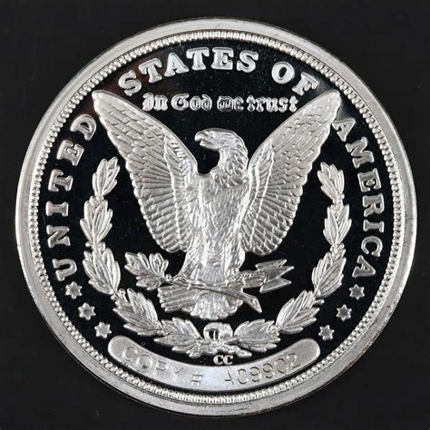 A Gold-Plated Double Eagle Replica and a Silver-Plated Morgan Dollar Replica | EBTH