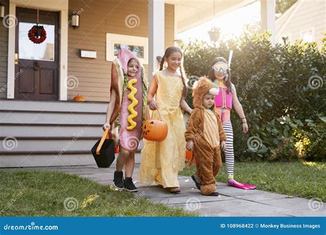 Children Wearing Halloween Costumes for Trick or Treating Stock Photo ...