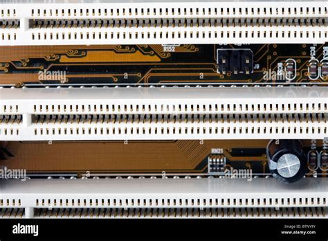 Close Up Of Section Of A Computer Motherboard Showing Rows Of Pci Slots