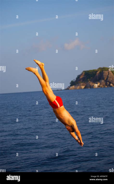 Man Diving Into Water For A Swim Stock Photo Alamy