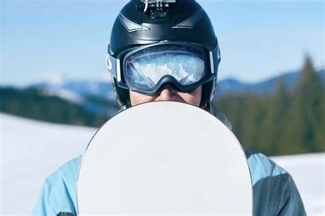 Premium Photo Snowboarder With Action Camera On A Helmet Close Up