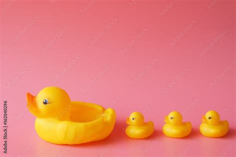 Rubber duck over pink background color Stock Photo | Adobe Stock