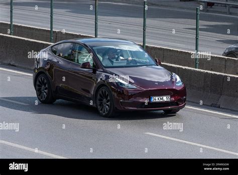 ISTANBUL TURKEY SEPTEMBER 17 2023 A Burgundy Color Tesla Model Y On