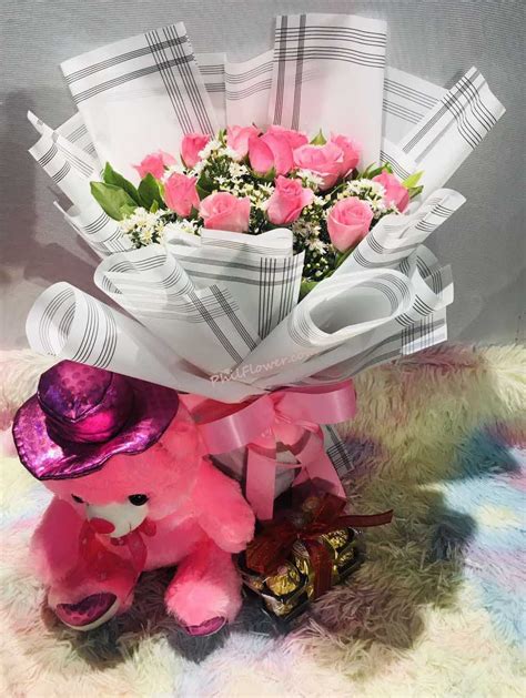 12 Pink Roses Bouquet 12 Ferrero Rocher And 8 Inches Teddy Bear To