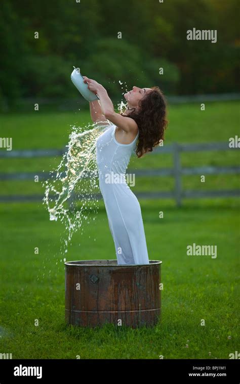 Woman Pouring Water Over Head Hi Res Stock Photography And Images Alamy