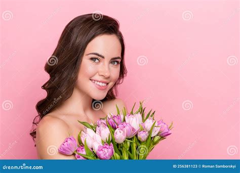 Photo Of Dreamy Adorable Young Woman Naked Shoulders Holding Flowers