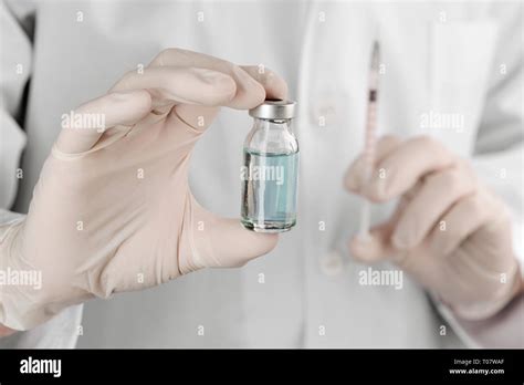 how to open a vial for injection