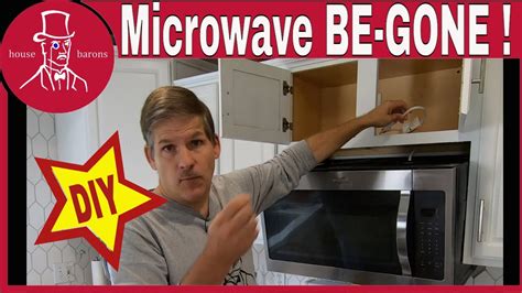 How To Uninstall A Microwave Remove A Whirlpool Microwave Oven YouTube