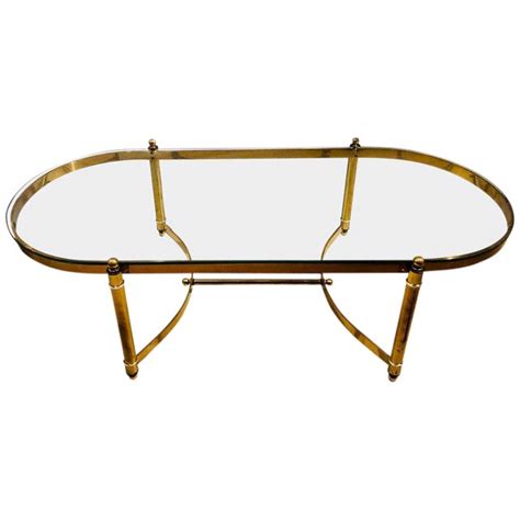 Hollywood Regency Style Heavy Brass Oval Coffee Table With A Glass Top Chairish