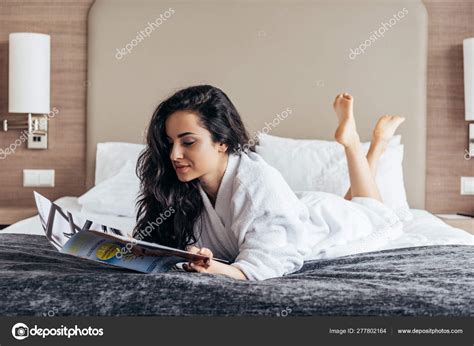 Pretty Barefoot Brunette Young Woman White Bathrobe Lying Bed Reading