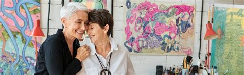 Joyful And Trendy Lesbian Artists Smiling Stock Photo Image Of Lgbtq