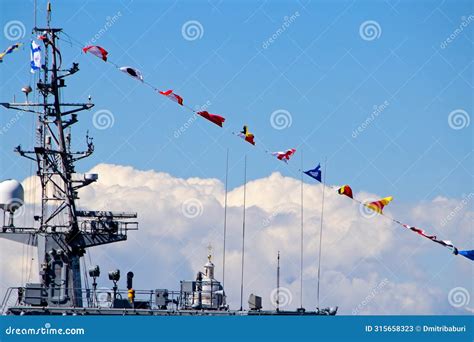 A Fragment Of The Mast Of A Modern Warship Decorated With Colorful