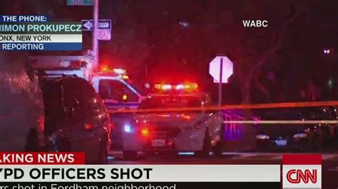 Two Nypd Officers Are Shot Responding To A Robbery Cnn