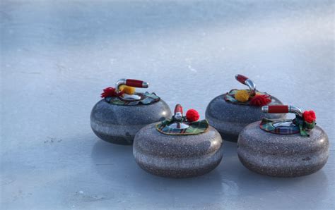 Curling Stones on ice image - Free stock photo - Public Domain photo