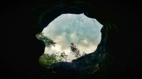 Premium Photo Sky Seen Through Cave