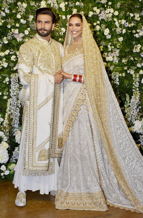 Ranveer Singh-Deepika Padukone Wear Ivory And Gold Abu Jani-Sandeep ...