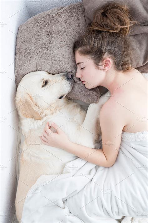 Teenage Girl Sleeping With Her Dog High Quality People Images