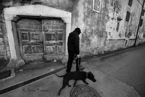 Man With Black Dog Juzaphoto