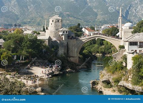 Mostar Bridge With Mountains In Background Bosnia And Herzegovina