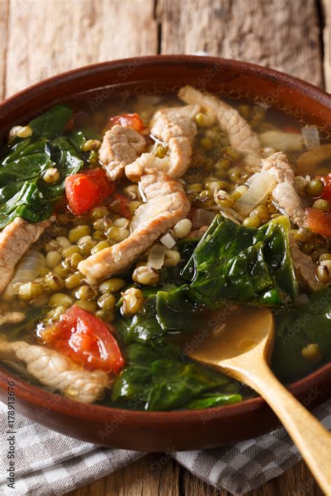 munggo guisado filipino soup  beans mung closeup   bowl vertical