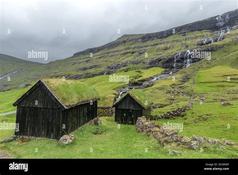 Turf Roofed Farm Buildings And Water Cascade Saksun Village Eysturoy