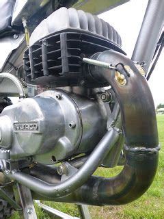 The Front End Of A Motorcycle Parked In A Field