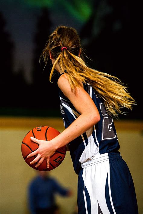 HD wallpaper: Woman in Blue and White Basketball Jersey Holding Brown ...