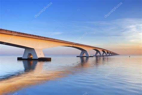 The Zeeland Bridge in Zeeland, The Netherlands at sunrise Stock Photo ...