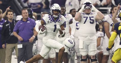 [sports] Tcu Upsets Michigan 51 45 In A Wild Cfp Semifinal Advancing