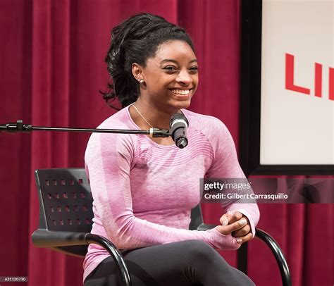 Us Olympic Gold Medalist Simone Biles Is Seen On Stage During A Qanda