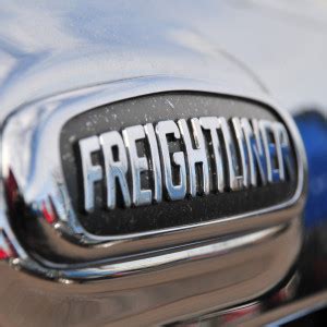 White Freightliner Logo